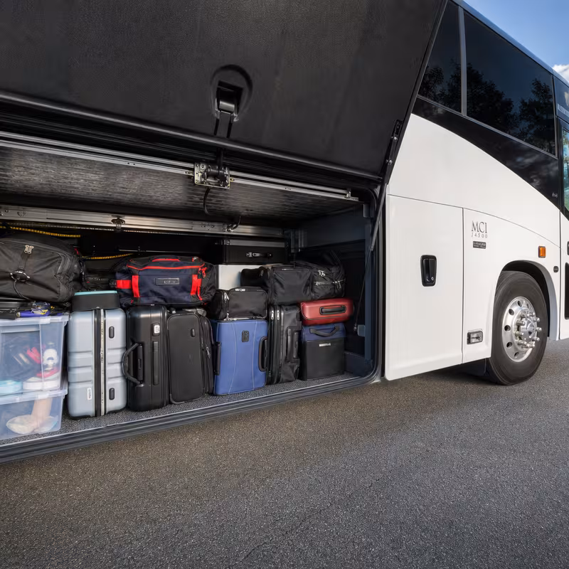 Party bus interior with wraparound leather seating and LED lighting in Los Angeles