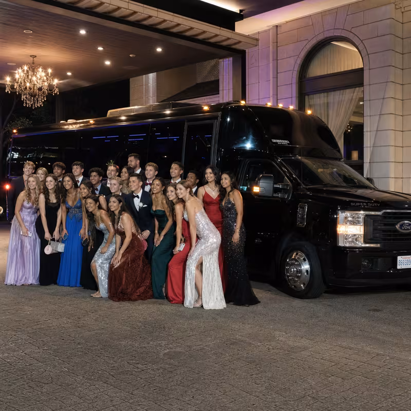 Party bus interior with wraparound leather seating and LED lighting in Los Angeles