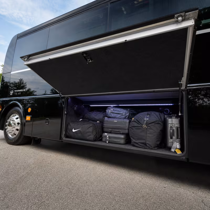 Party bus interior with wraparound leather seating and LED lighting in Los Angeles